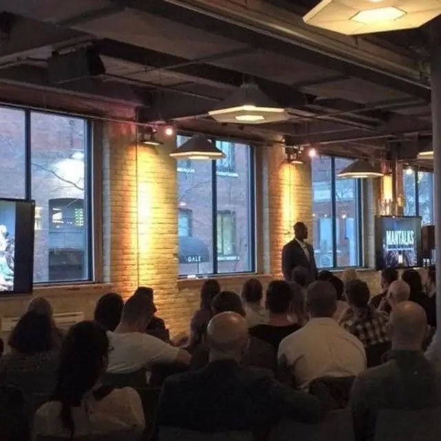 Gary Durrant speaking to a full room